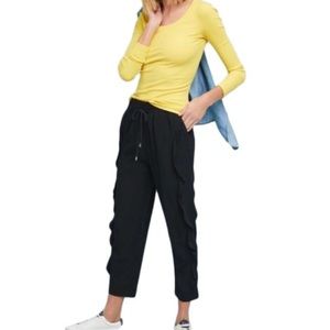 Anthropologie Black Drawstring Pants with Ruffle Front Detail